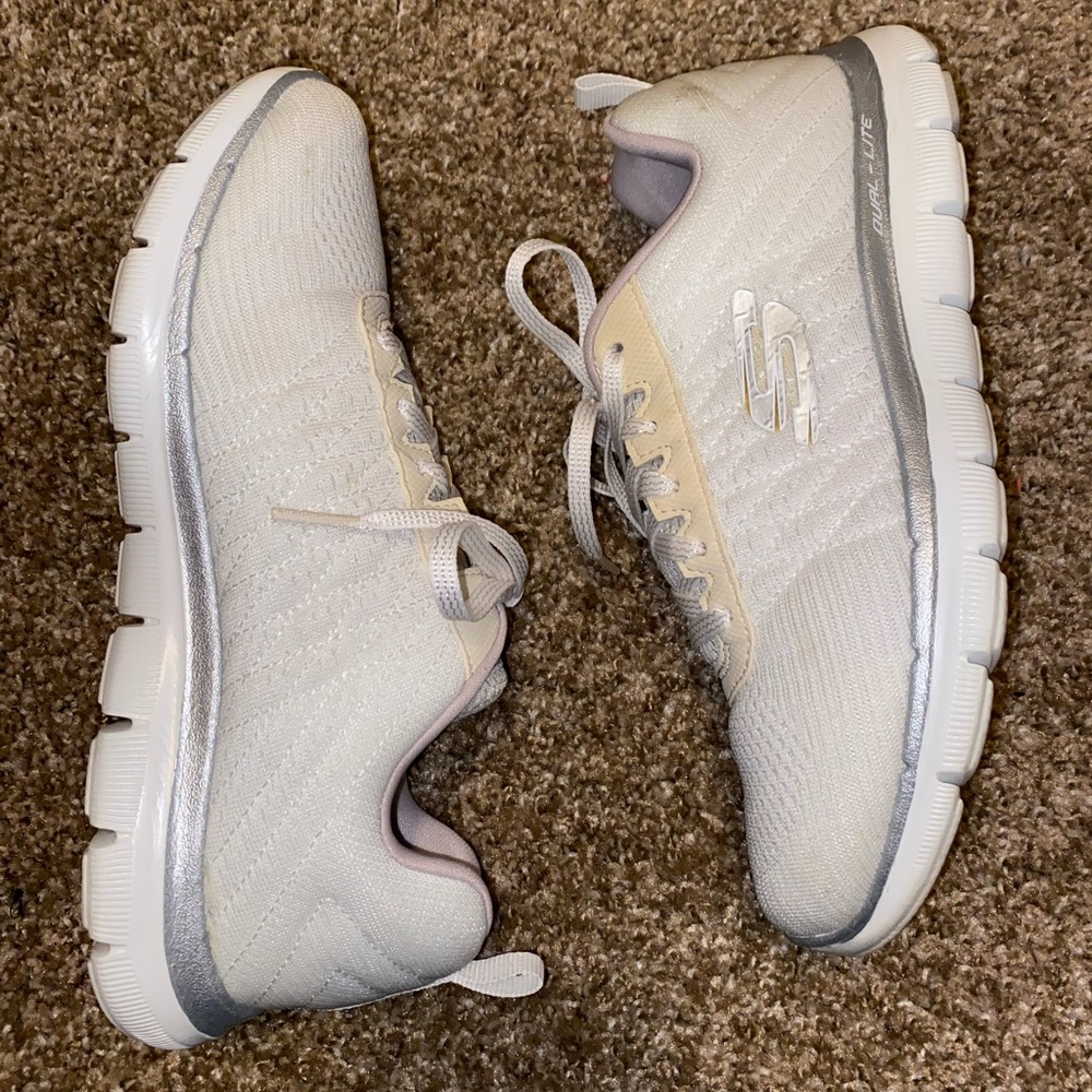 White and silver Skechers for women in size 7